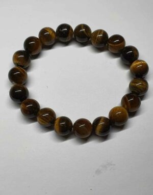 Œil de tigre bracelet boule 10 mm disponible dans notre boutique Le Monde des Stones à Charroux